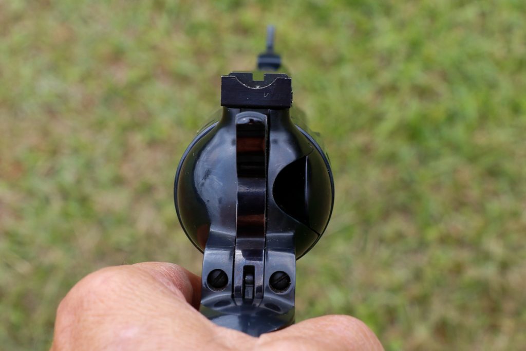 Recoil shield design on this type of revolver DOES block view of cartridge rims in cylinder when aimed from eye level.